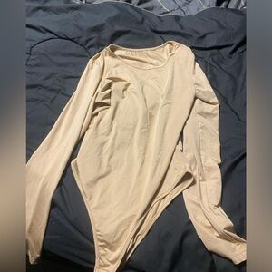 Large tan bodysuit